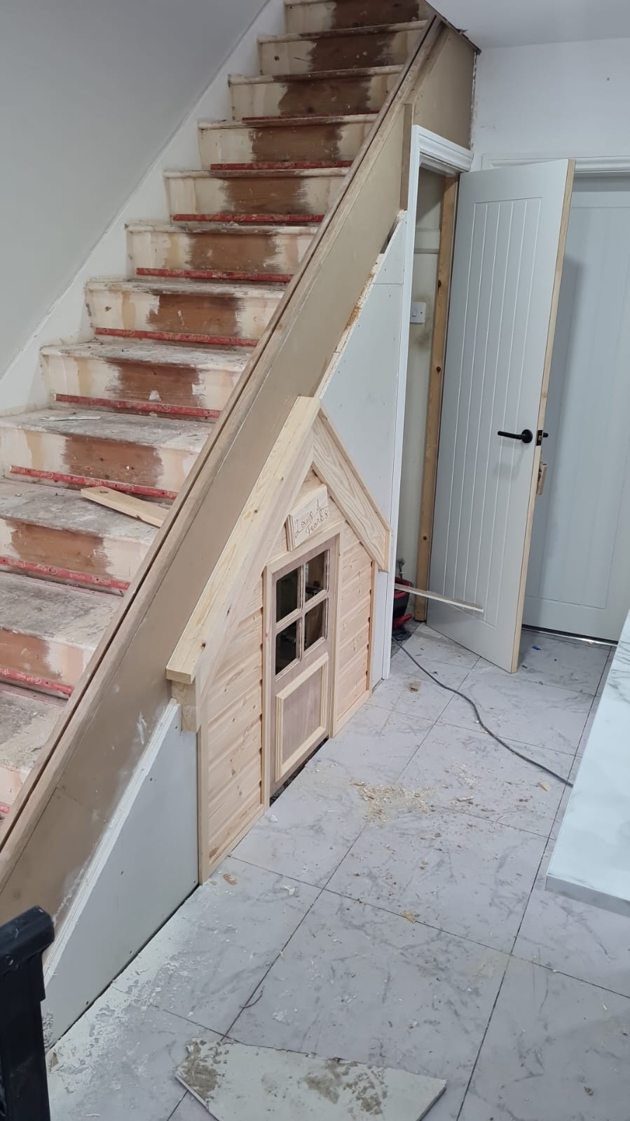 Bespoke under-stairs dog house — Eves Joinery